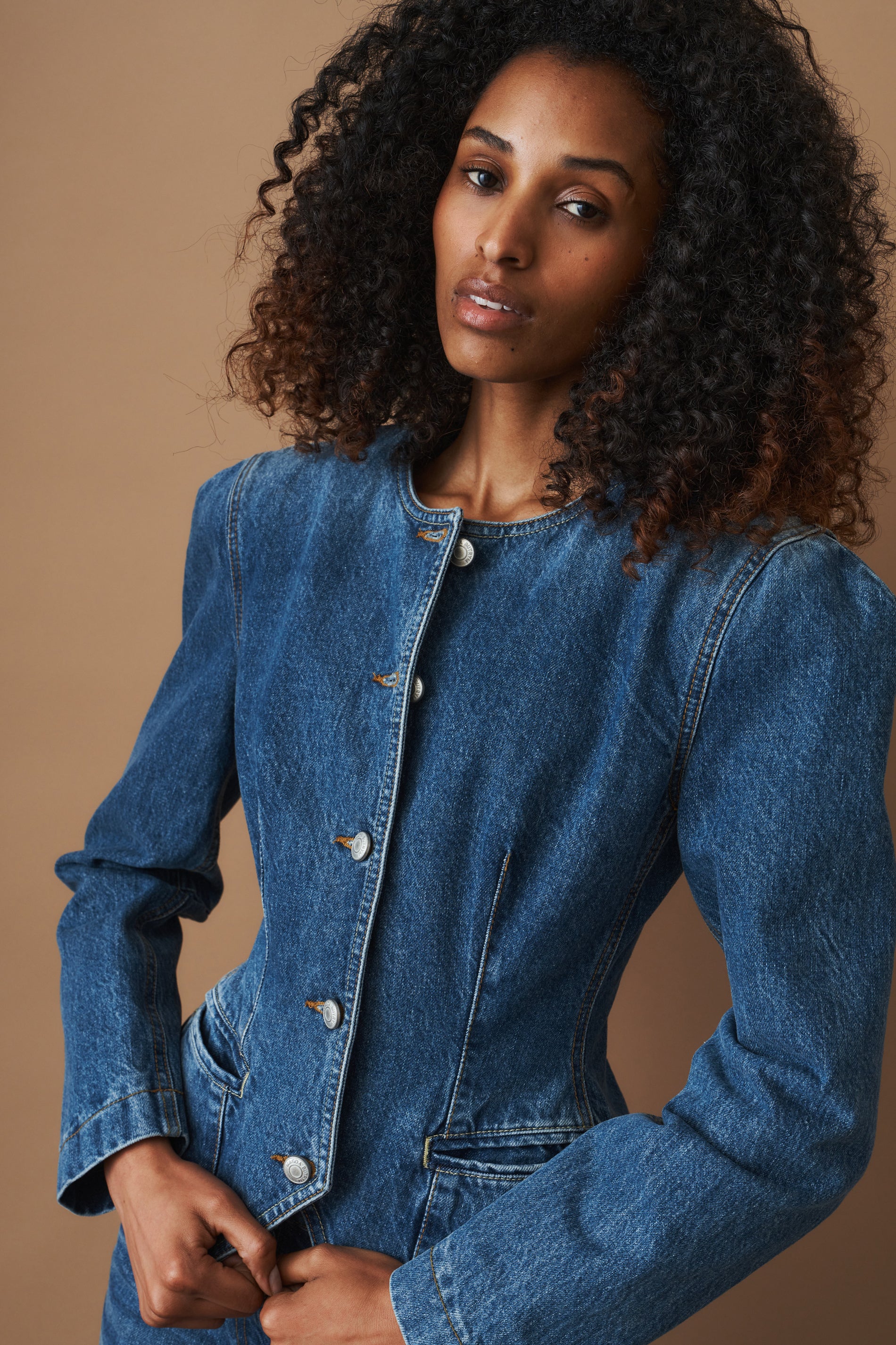 Fitted Denim Peplum Jacket in Blue