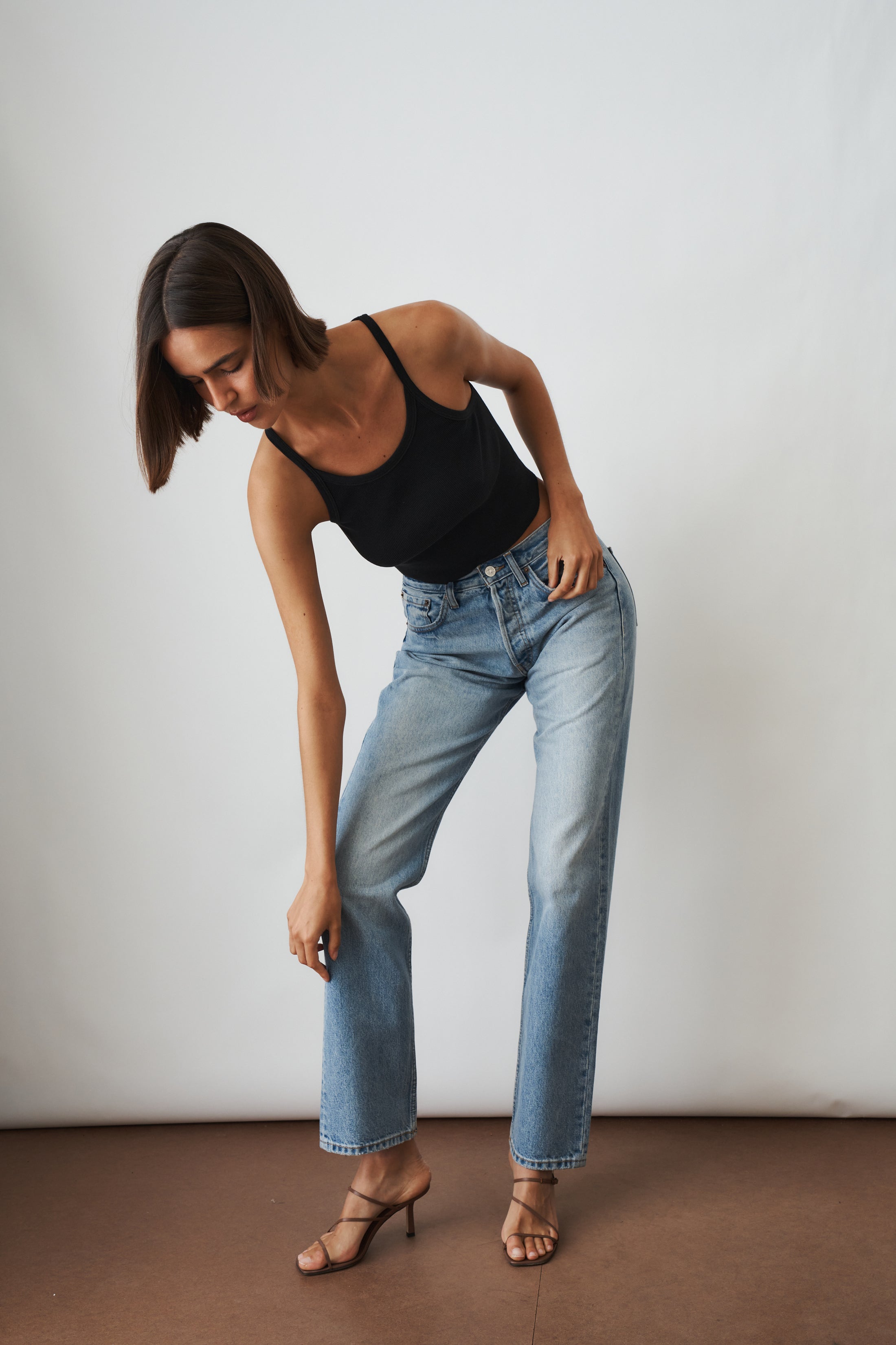 Aya Muse straight jeans in XXS size, featuring classic denim fabric and a fitted pant style, displayed on a model.