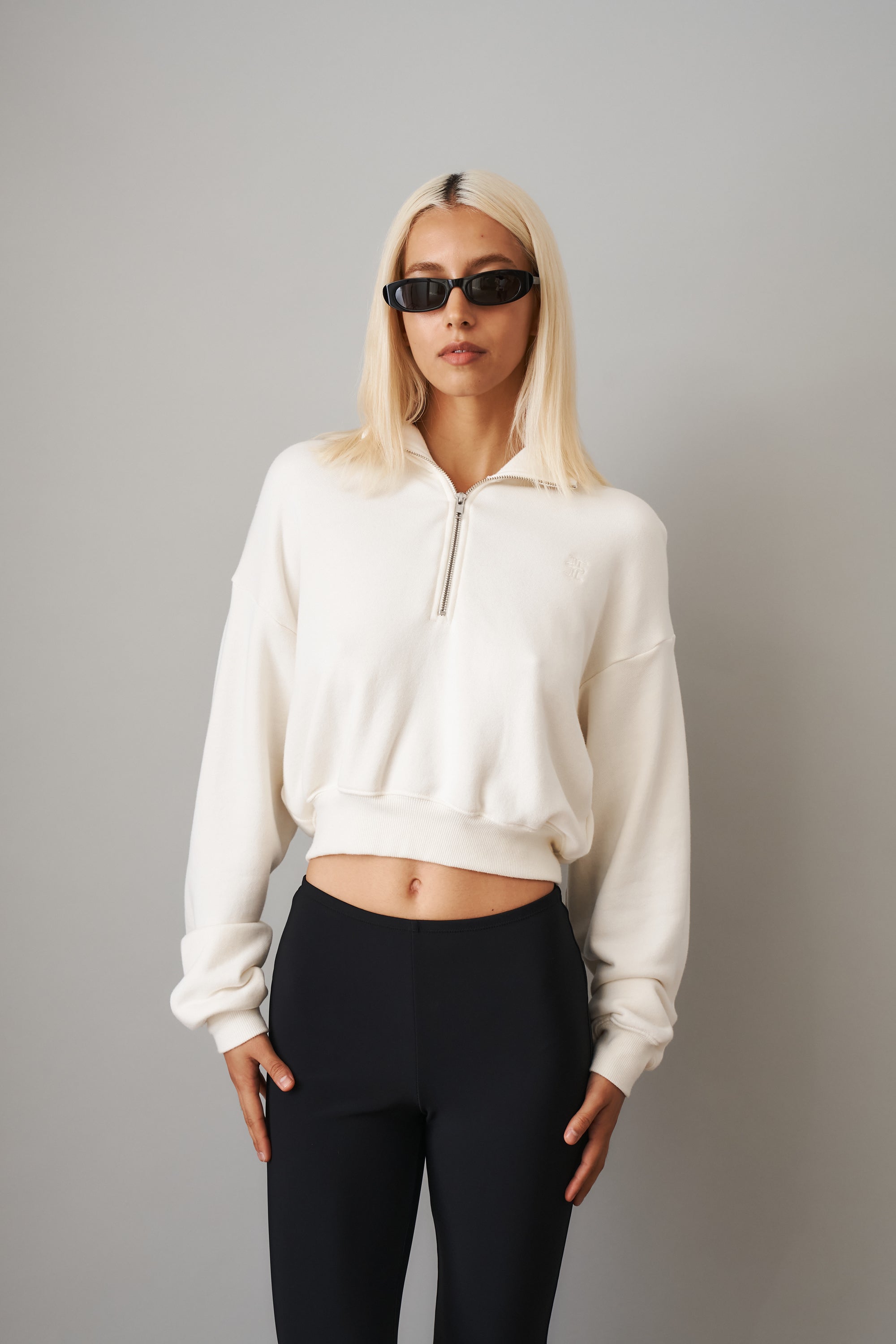 Cream cropped half zip sweatshirt from ETERNE, styled as a casual tops with a relaxed fit and sporty design.