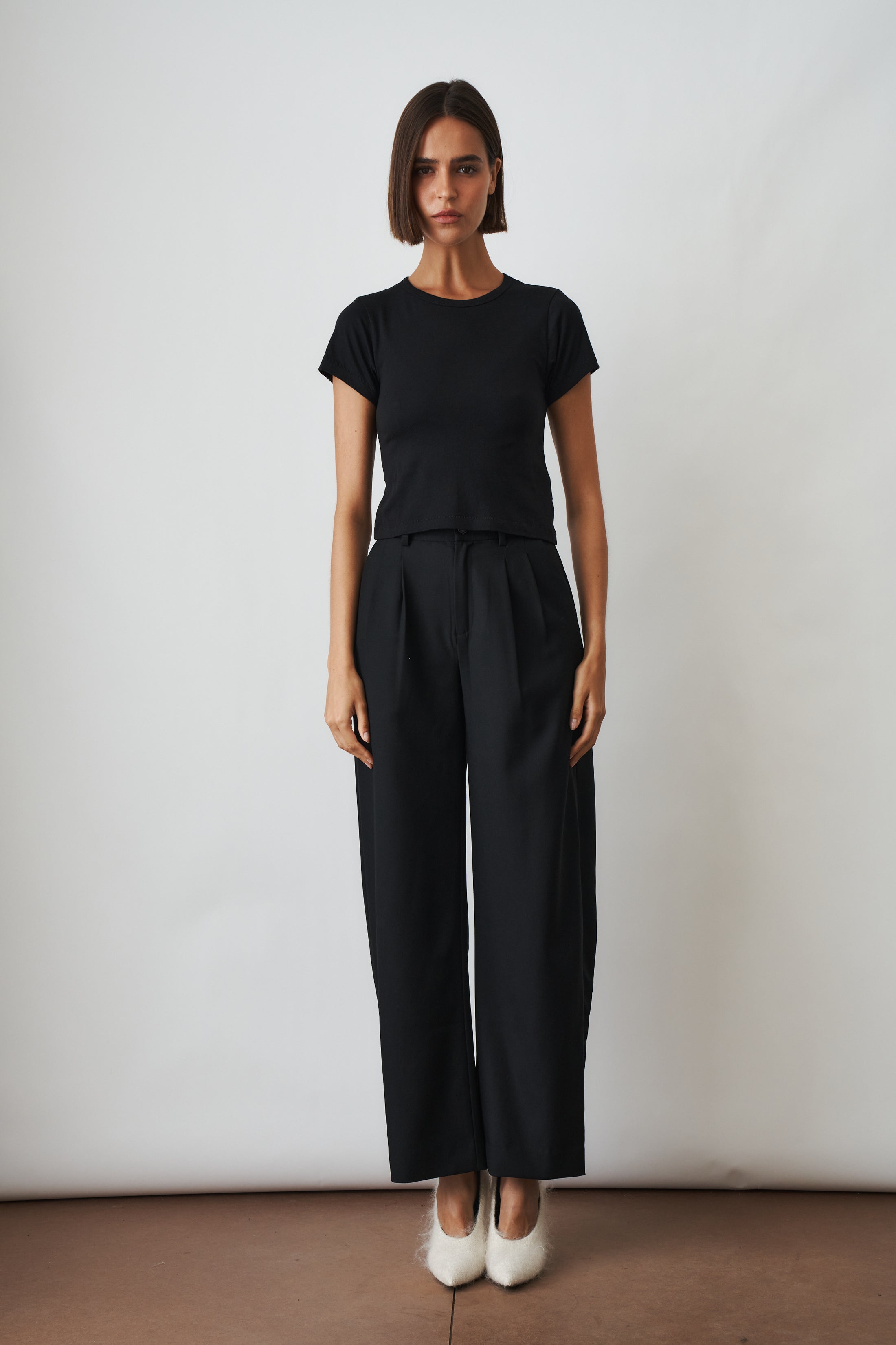 Black short sleeve baby tee from ETERNE, casual tops for infants with soft fabric and comfortable fit.