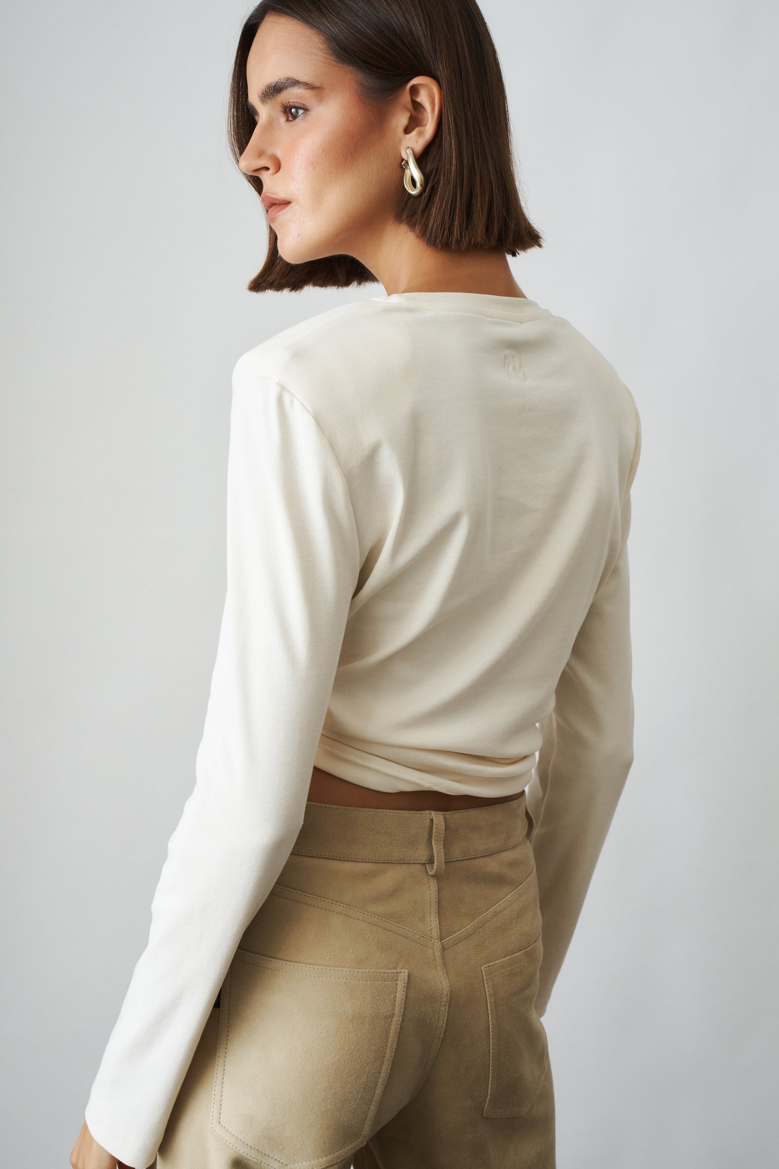 Knotted Long Sleeve Jersey Blouse in Cream - DÉSORDRE