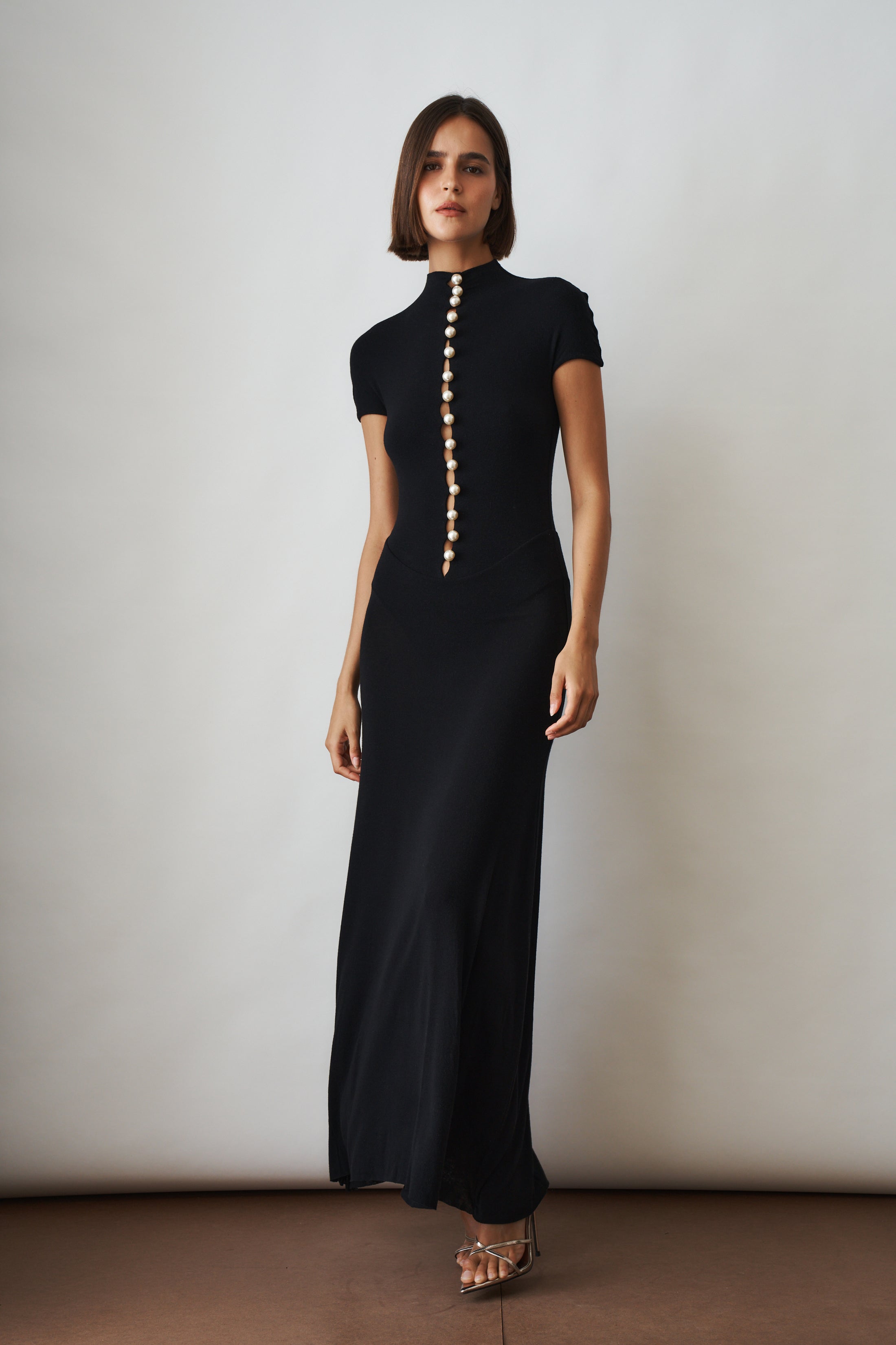 Black Mia Dress by MANURI featuring a stylish, fitted design perfect for casual or semi-formal occasions.