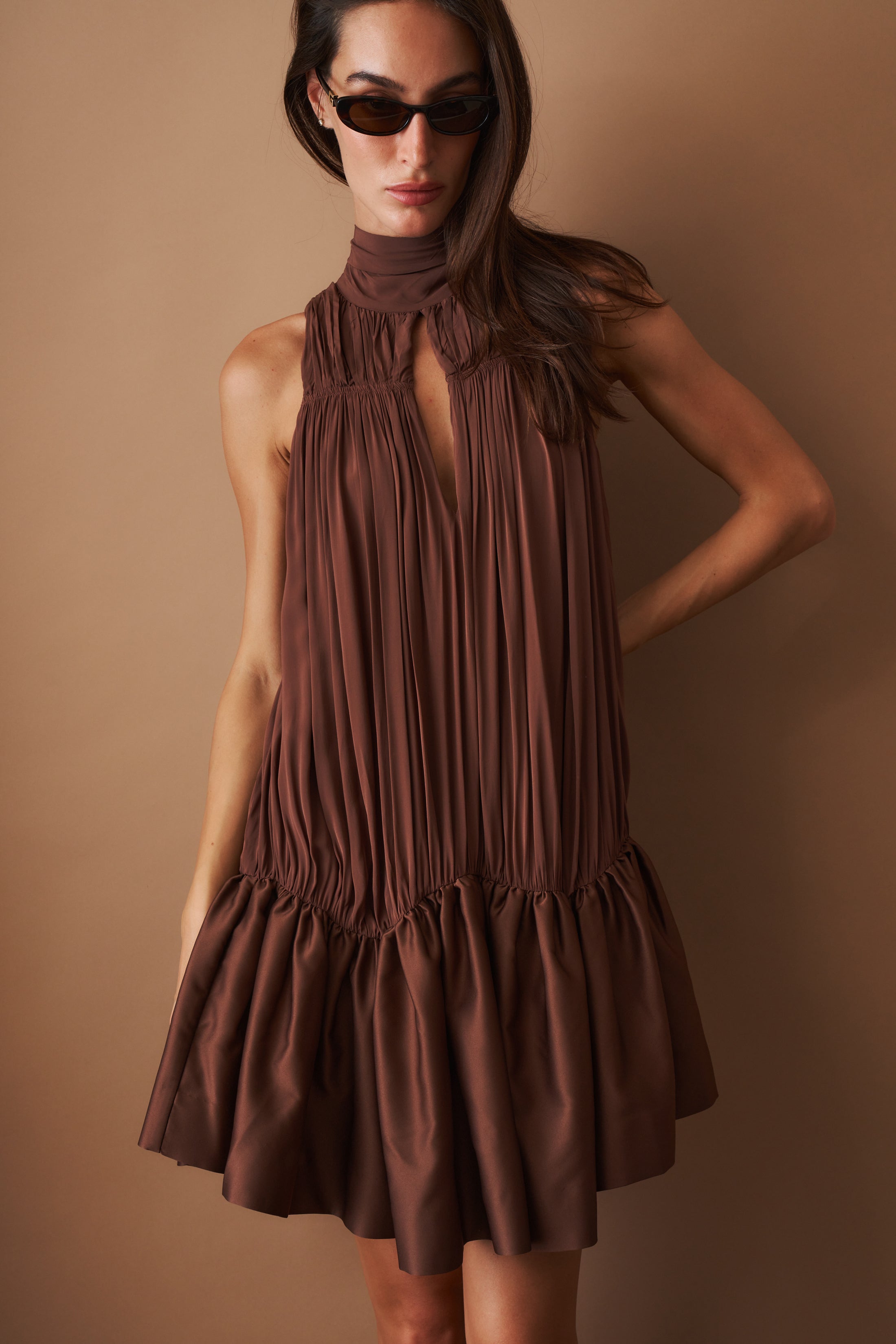 Rotate Gathered Mini Dress in a stylish design, featuring a fitted silhouette and elegant details, perfect for casual or dressy occasions.