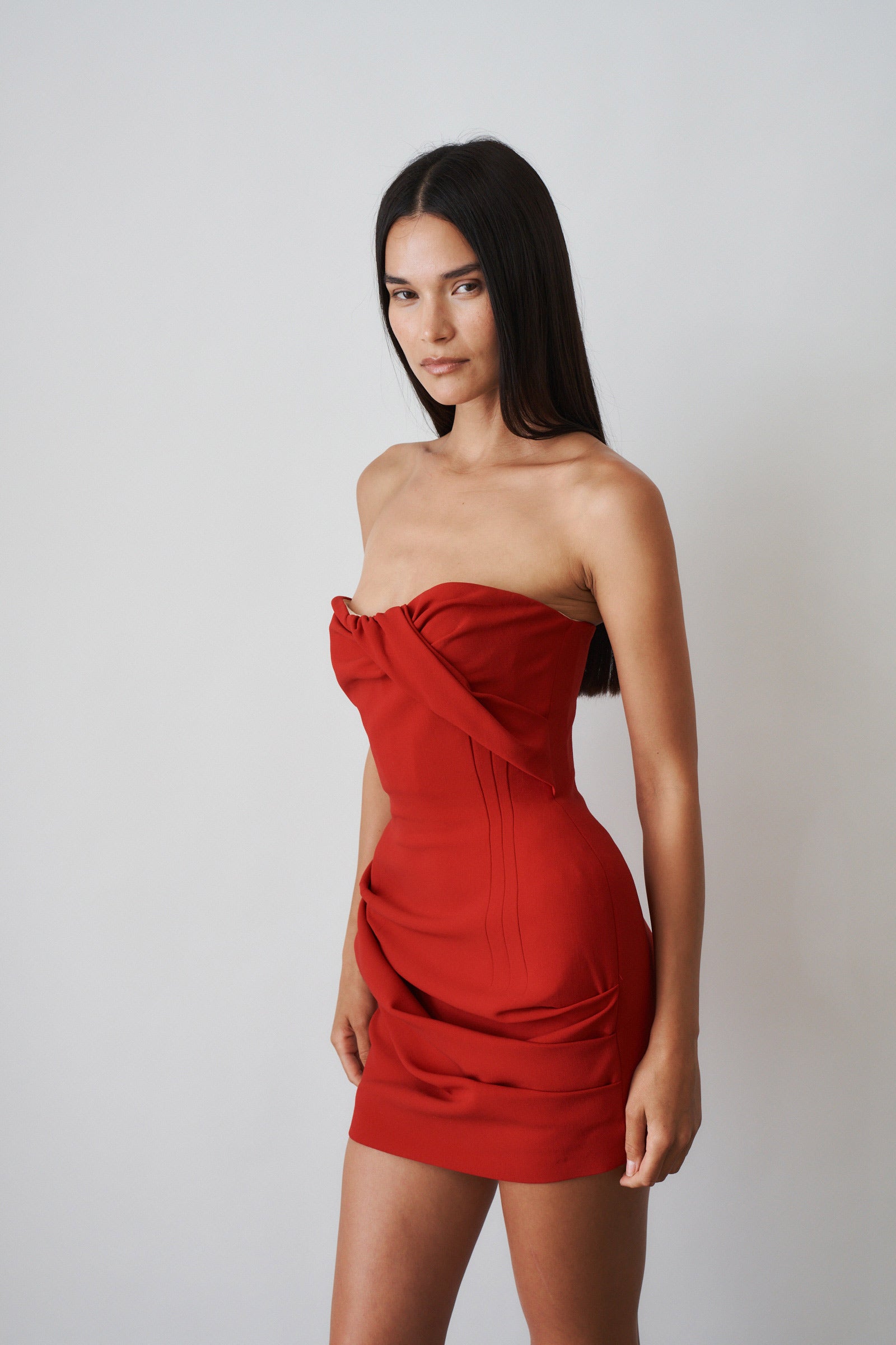 Structured drape corset mini dress in red