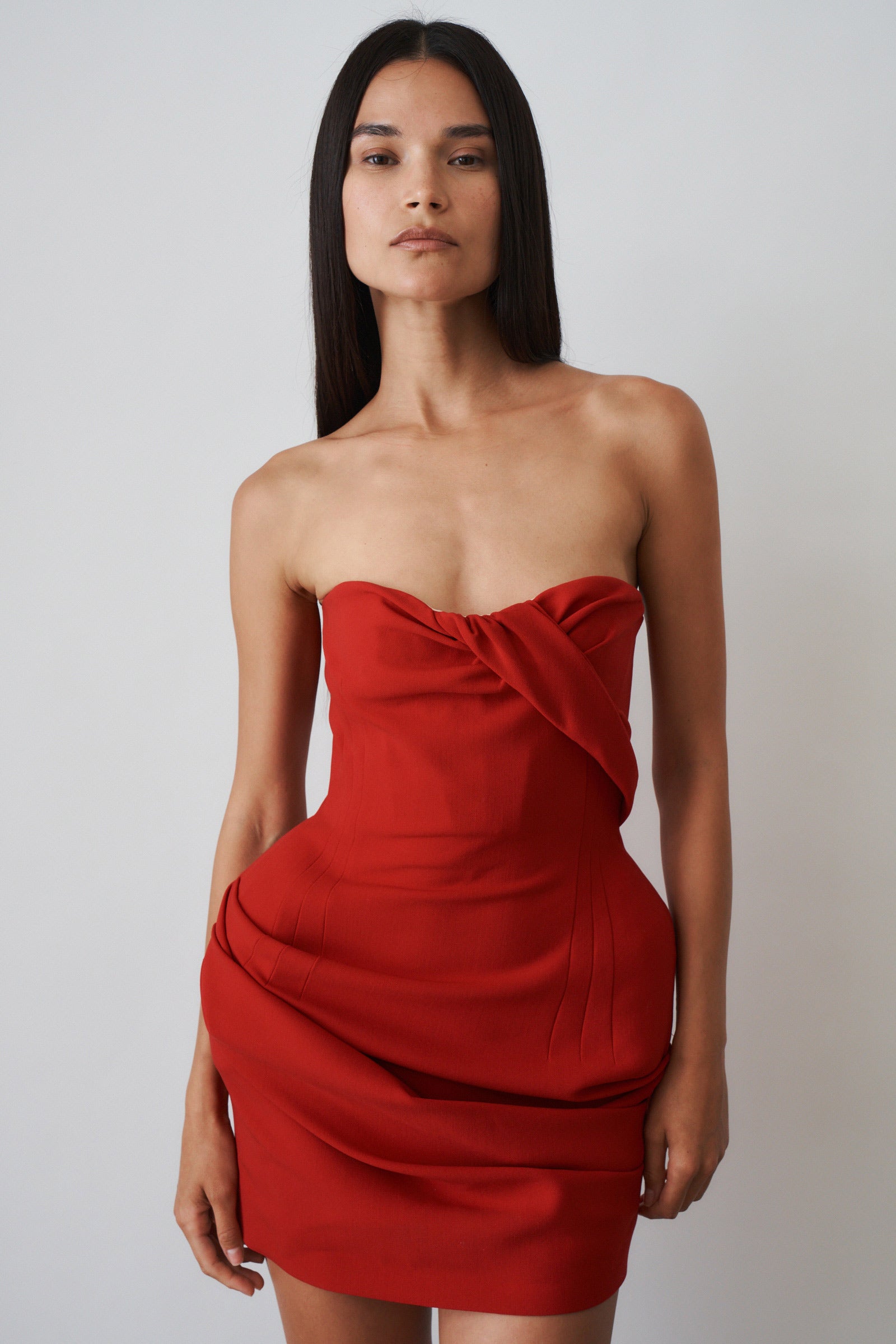 Structured drape corset mini dress in red