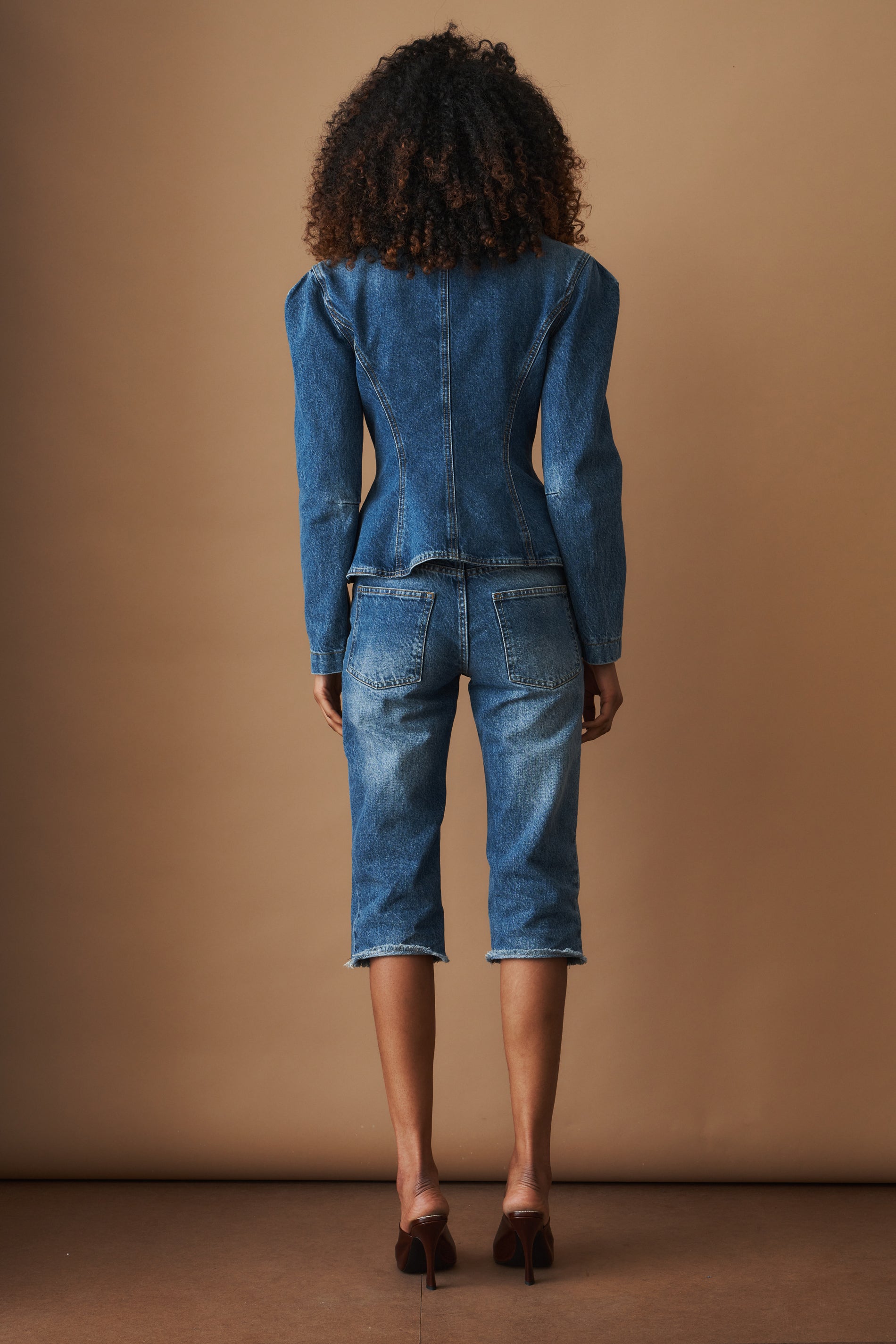 Fitted Denim Peplum Jacket in Blue