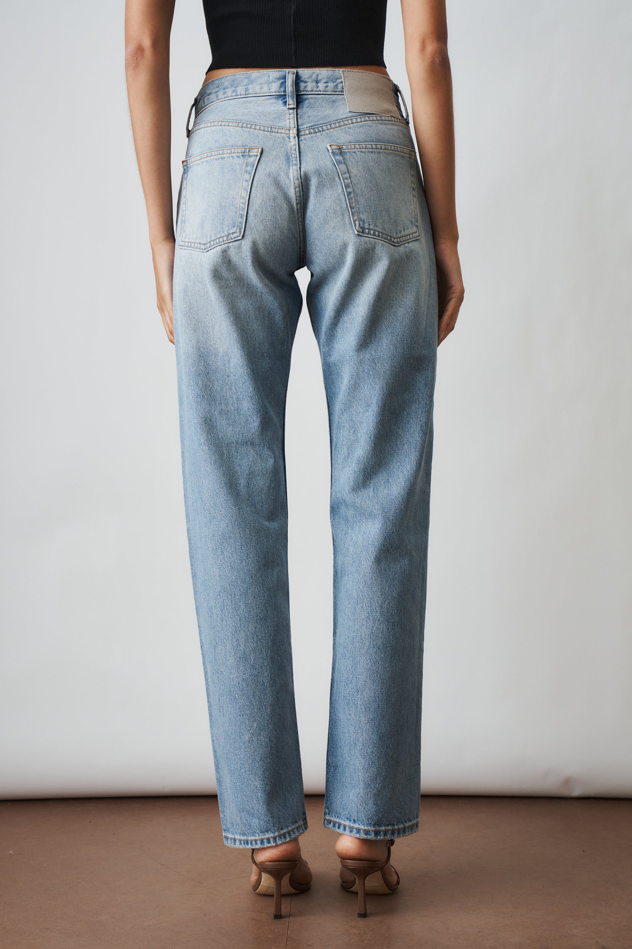 Aya Muse straight jeans in XXS size, showing classic denim pants with a fitted waistband and straight-leg design.