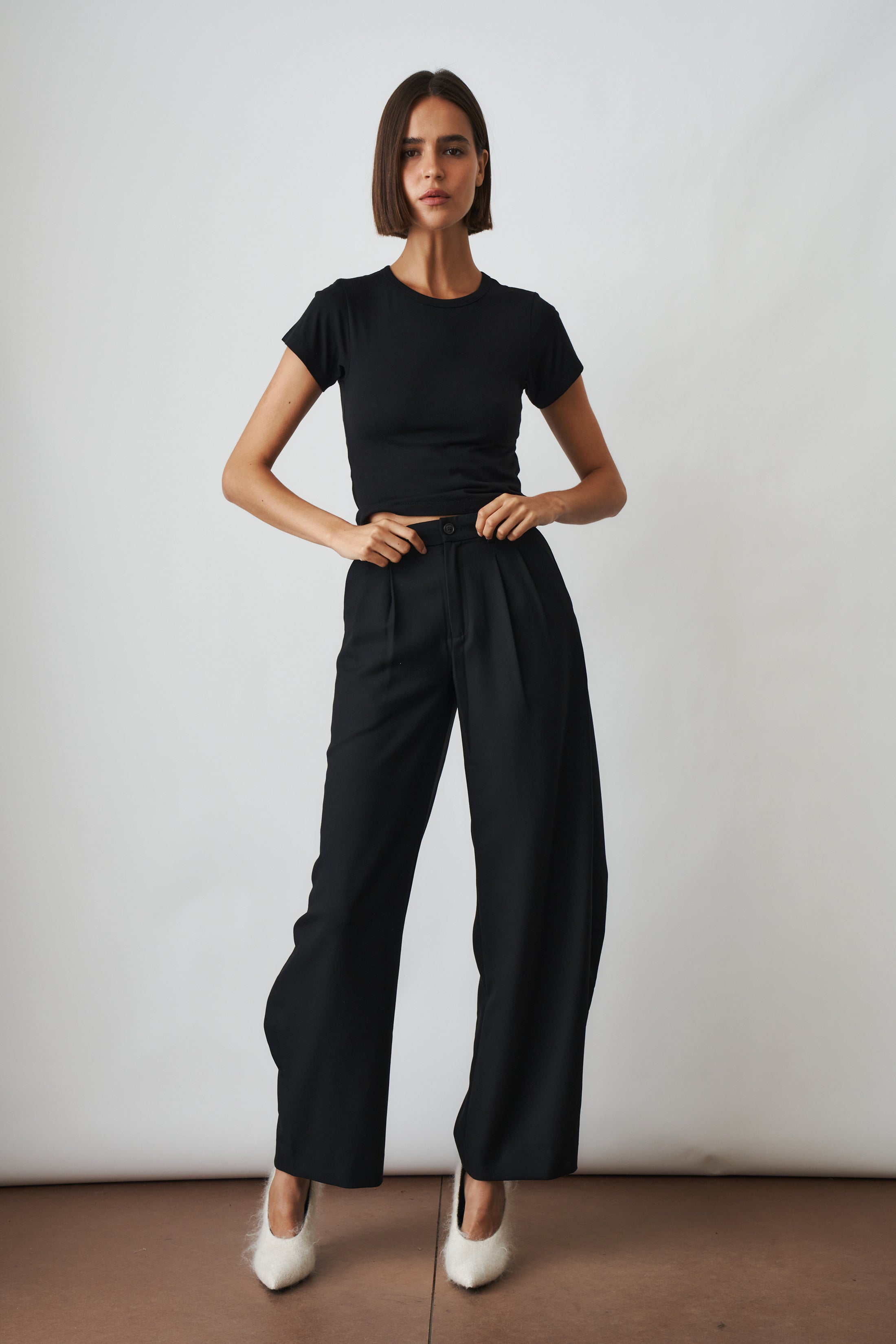 Black short sleeve baby tee from ETERNE, casual toddler top with soft fabric and simple design.