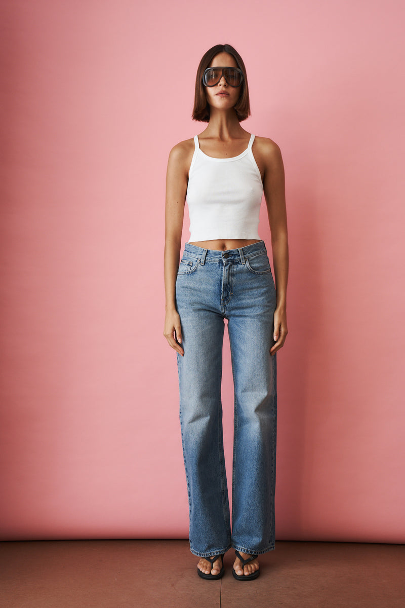 Haikure Korea Nordic Blue jeans, slim fit denim with classic five-pocket design and subtle fading details.