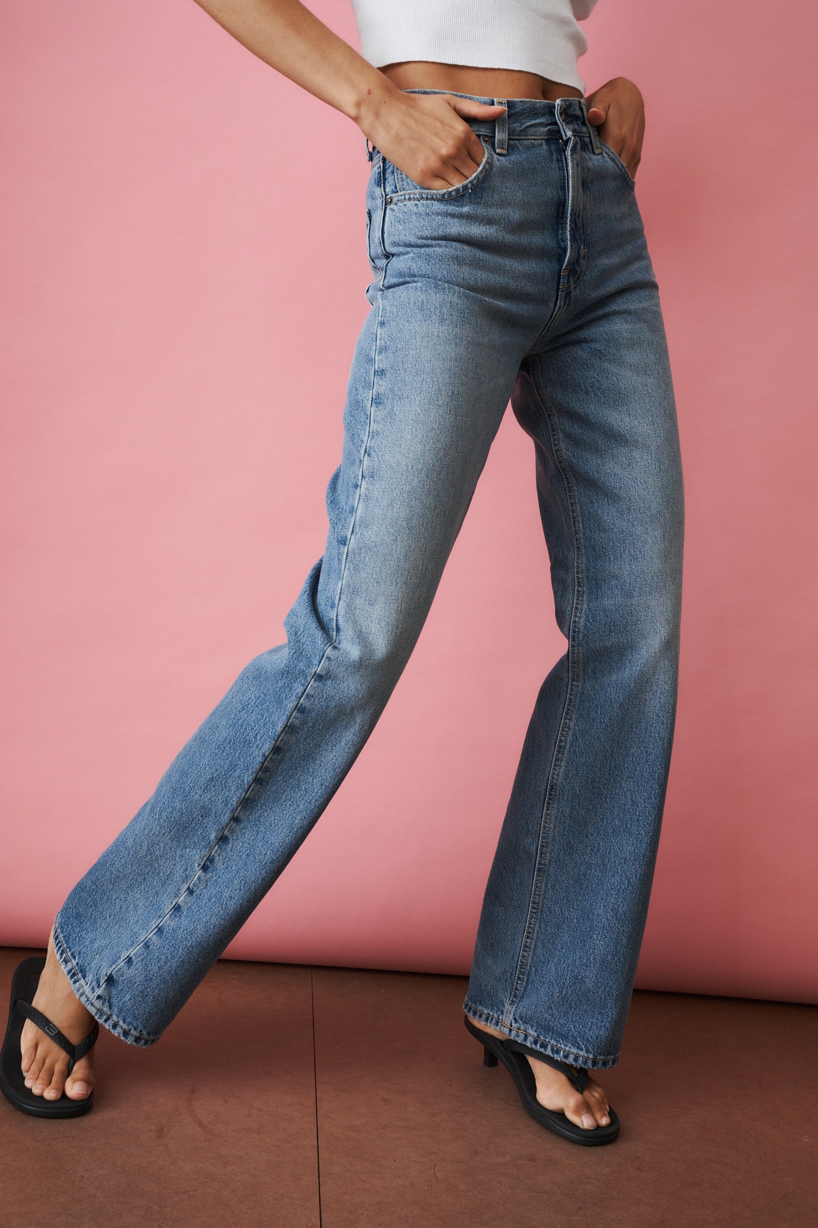 Haikure Korea Nordic Blue jeans displayed, featuring a classic denim design with a relaxed fit and stylish stitching.