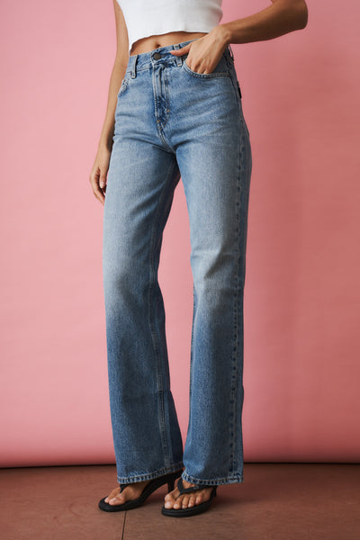 Haikure Korea Nordic Blue jeans featuring a slim fit design and classic denim look.