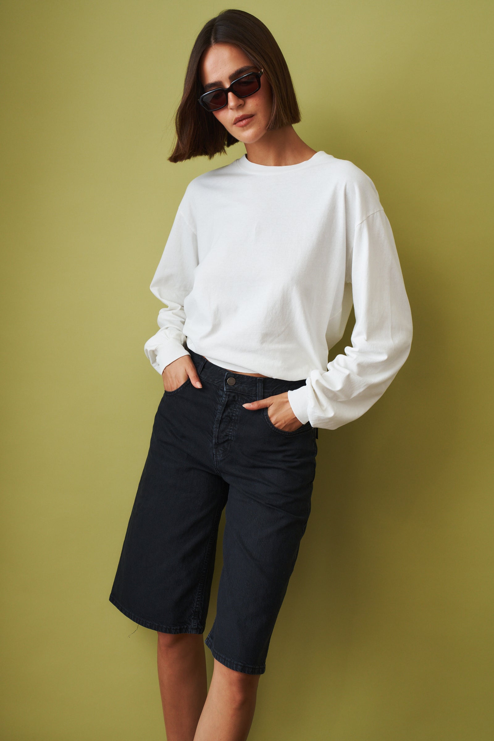 Off-white Ellys T-shirt by Haikure, casual tops with a relaxed fit, featuring a simple crew neckline and short sleeves.