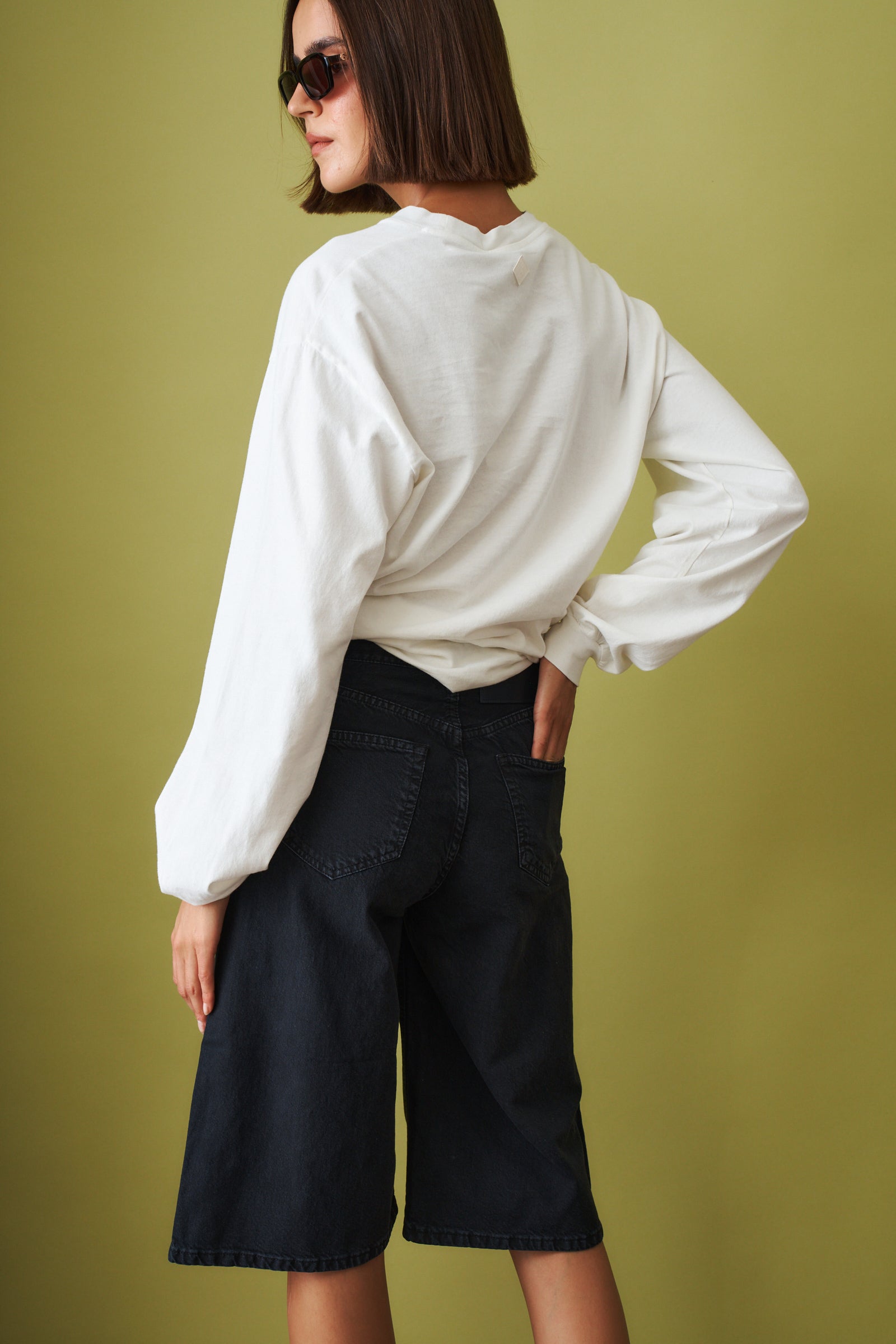 Haikure Ellys off-white T-shirt, casual tops with a relaxed fit, featuring short sleeves and a soft fabric look.