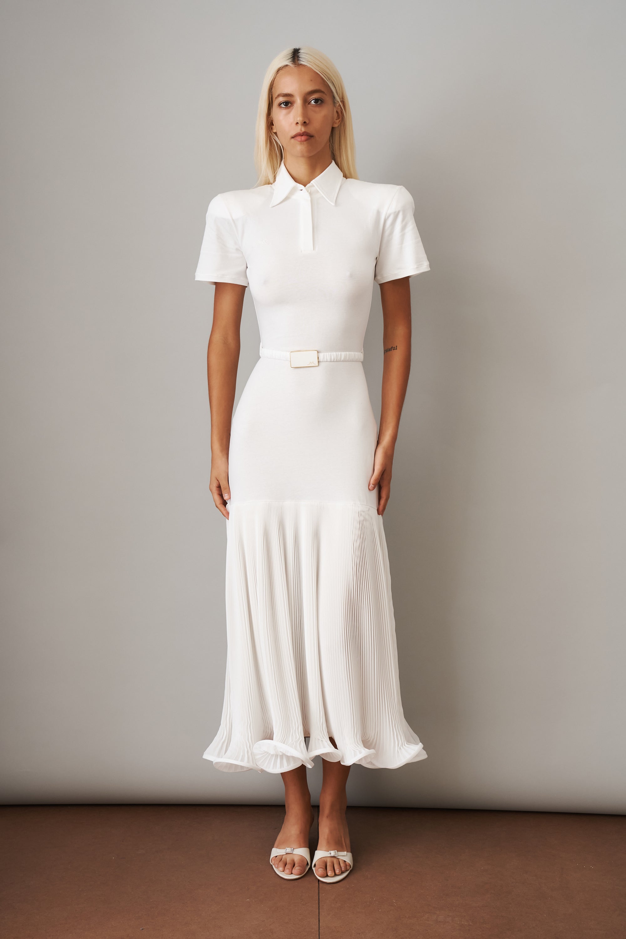 Polo Dress with Pleated Skirt in White - DÉSORDRE